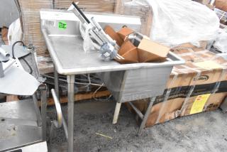 Win-holt commercial single bay sink with left side drain board, stainless steel, used condition, labels attached.