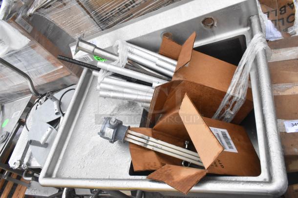 Win-holt Commercial Single Bay Sink with left side drain board, used, steel construction, visible scratches and packaging residue.