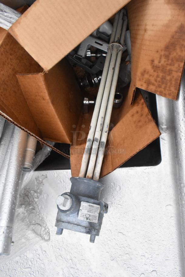 Win-holt Commercial Single Bay Sink with left side drain board, includes component parts, in used condition.