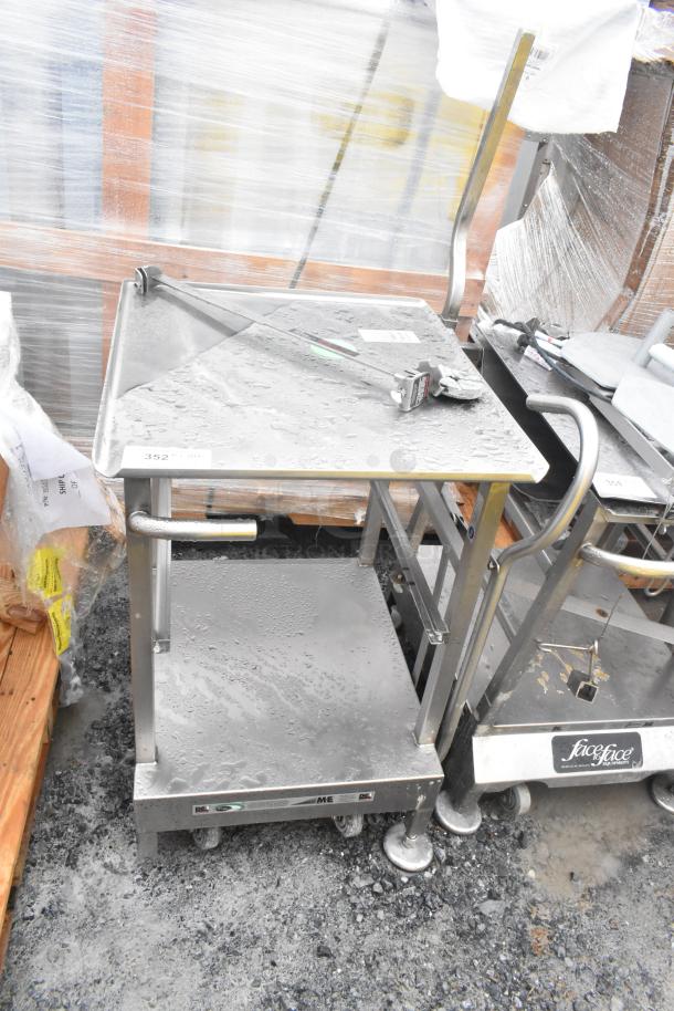 Face to Face Commercial Meat Slicer Equipment Stand, stainless steel, wheeled base, handle, sturdy construction, industrial use.