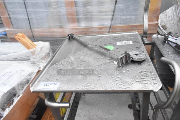 Face to Face commercial meat slicer equipment stand with sturdy metal construction, slight wear, auction label "352" visible.