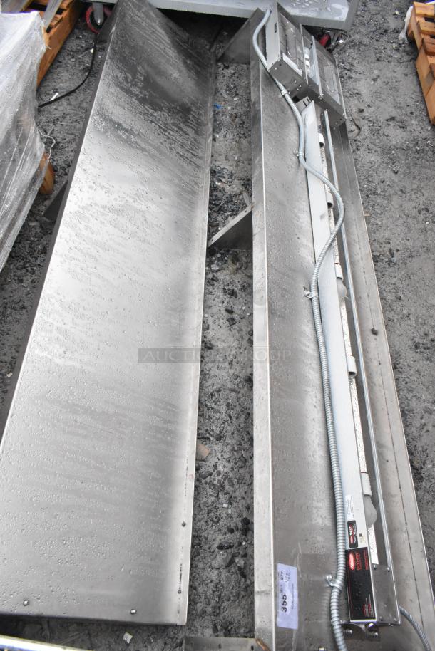 Two Hatco GRAHL-18D/HL-66 Glo Ray Strip Warmers, 120V, 1 Phase, stainless steel, with attached power cords, auction label visible.