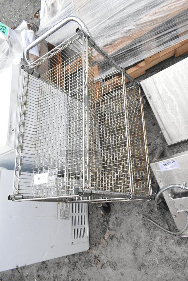 Chrome finish 3-tier wire shelf cart on commercial casters. Features durable construction with handles, label "356".