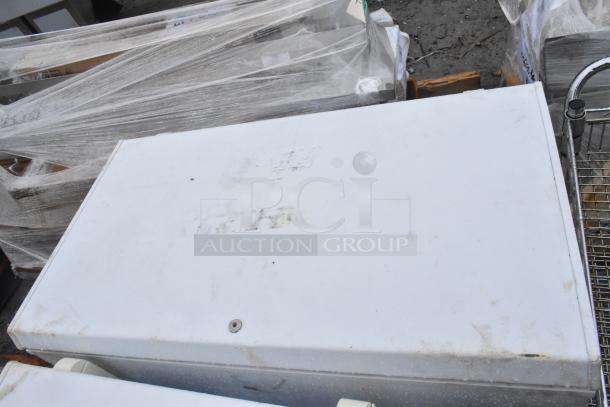 Two Haier HF50CM23NW/HF71CL53NW chest freezers, 115 volts, 1 phase, visible wear, packaged for auction.