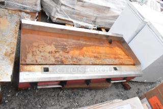 2024 Avantco 177CAG60TG 60" countertop gas griddle, visible rust and wear, five control knobs, 175,000 BTU label intact.