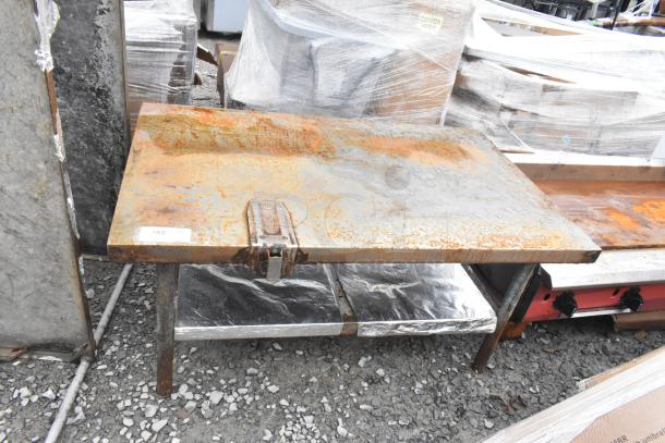 Commercial equipment stand with can opener mount and undershelf, rusted surface, suitable for kitchen use. Tag indicates item 359.