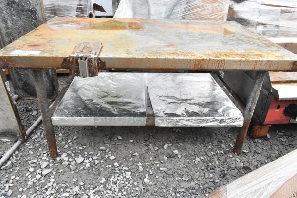 Commercial equipment stand with rusted finish, features a mounted can opener and under shelf, suitable for heavy-duty use.