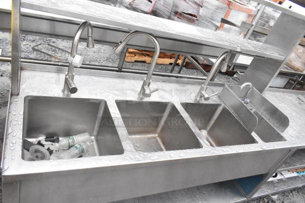 Commercial prep station with 3 bay sink, single hand sink, under shelves, and overhead shelf. Stainless steel, used condition.