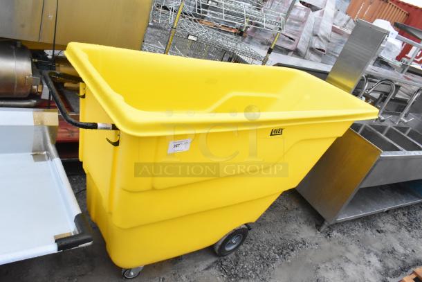 Lavex 475UTT10HNDL yellow poly tilt truck, 1 cubic yard, visible handle, logo, excellent condition, industrial setting.