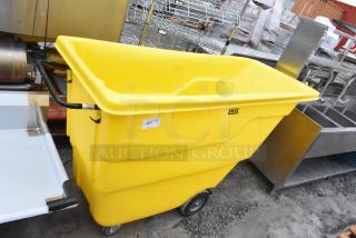 Lavex 475UTT10HNDL yellow poly tilt truck, 1 cubic yard, visible handle, logo, excellent condition, industrial setting.