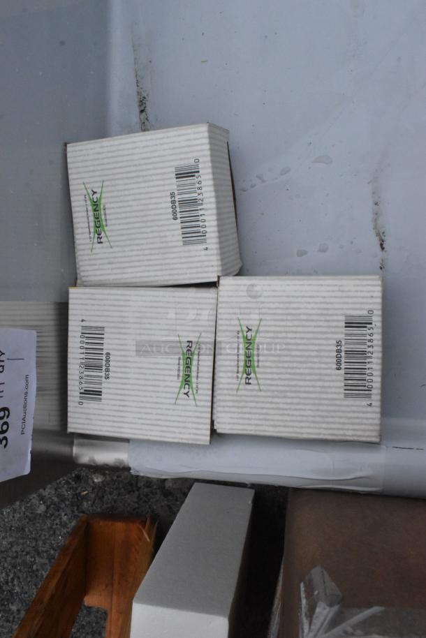 Regency 600S31824218 Commercial 3 Bay Sink, new condition with minor scratches. Includes packaging with model details.