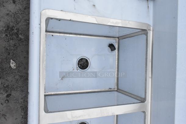 Regency 600S31824218 Commercial 3 Bay Sink, brand new with visible scratches and dents. Stainless steel construction.