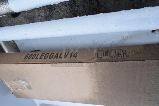 Cardboard packaging for Regency 600S31824218 3 Bay Sink. Marked "600LEGGALV14" with barcode. New, minor scratches.