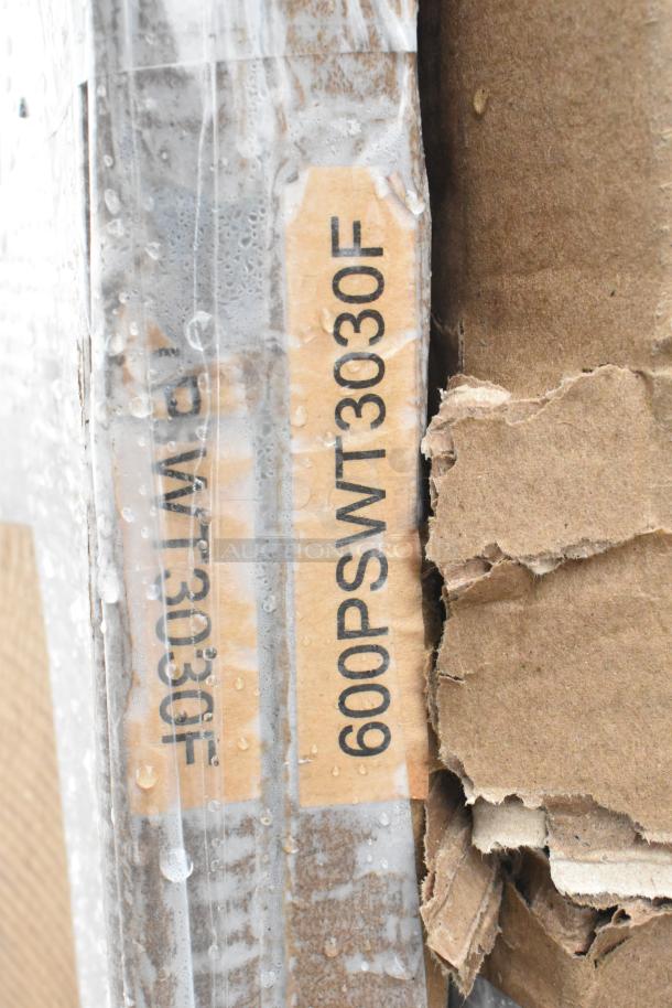 Packaged Regency 600PSWT3030F table top, visible label, new scratch and dent condition, cardboard packaging.