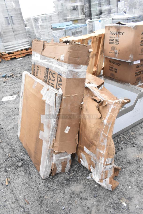 Damaged boxes of 3BRAND items, including Regency and Lavex products. Visible packaging damage, items unassembled.