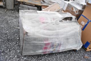 Brand new Avantco BC-72-HC 72" refrigerated bakery display case, curved glass, in scratch and dent condition, wrapped on pallet.