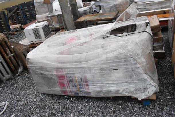 Brand new Avantco BC-72-HC 72" curved glass bakery display case, white, wrapped on pallet, minor scratches noted.