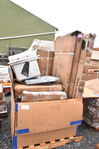 Auction lot of 10 brand new scratch and dent items, including a sink and work table, in original packaging on a pallet.
