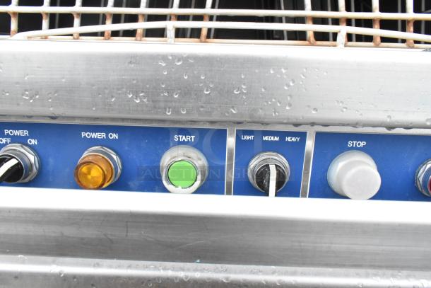 LVO FL14E pot and pan washer control panel; features power, start, and wash cycle settings. Shows signs of use.