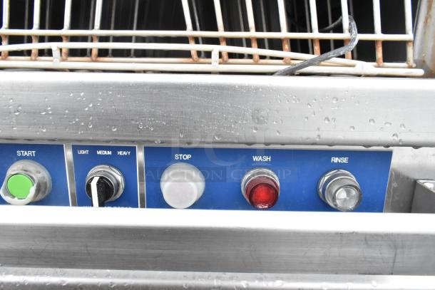 LVO FL14E stainless steel commercial pot and pan washer controls, showing start, stop, wash, rinse buttons, and cycle dial.