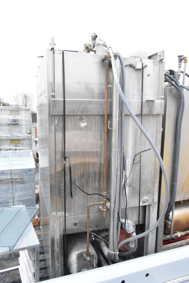 LVO FL14E stainless steel commercial front load pot and pan washer, 460V, 3-phase, showing exterior pipes and wires.