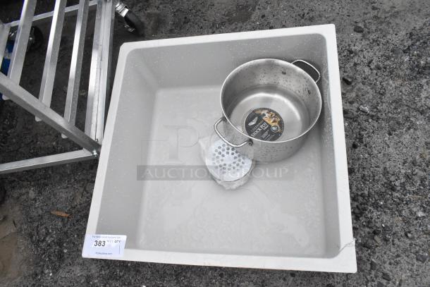 Poly mop sink with drainage holes, light wear visible. Includes metal stockpot and strainer. Auction tag indicates lot 383.