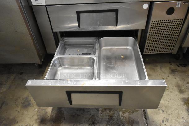 2018 True TRCB-48 2 Drawer Chef Base, stainless steel, 115V, on casters. Open drawer shows condition and compartments.