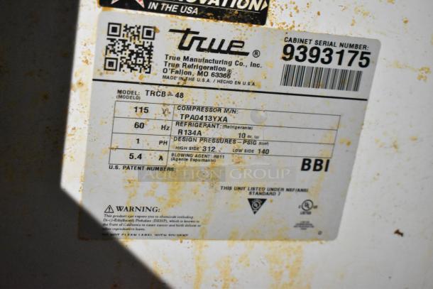 2018 True TRCB-48 Chef Base label, shows model, voltage, phase details, refrigerant type, and compressor info, with visible wear.