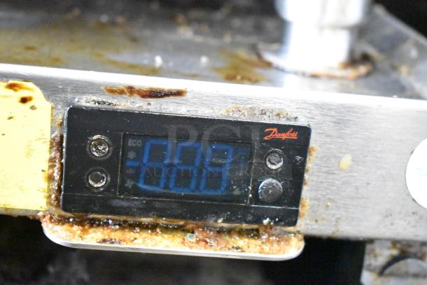 2017 Delfield F2936CP commercial chef base. Features two drawers, visible control panel, and commercial casters. Used condition.