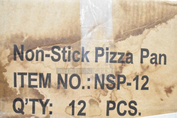 3 new boxes of NSP-12 non-stick pizza pans, 12 pans per box, shown in original packaging.