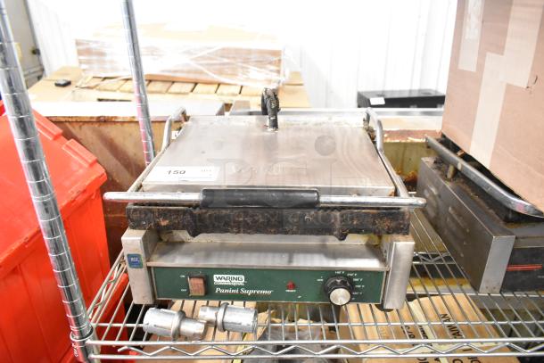 Waring WPG250 countertop panini press, stainless steel, used condition, 120V, 1 phase, visible wear on surface, NSF label.