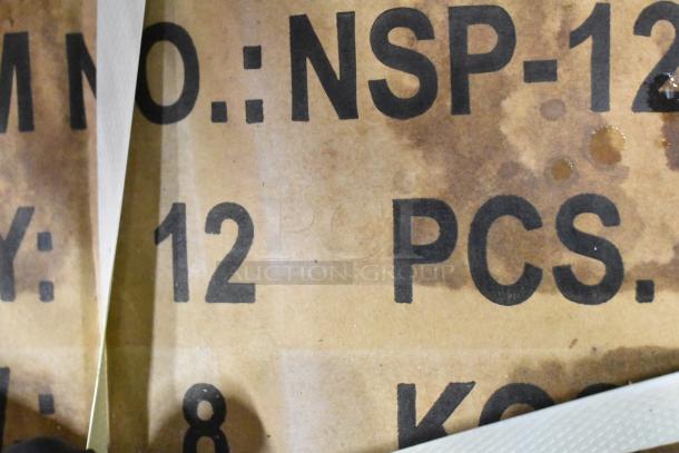 Two brand new boxes of NSP-12 non-stick pizza pans, 12 pieces each, in original packaging.