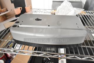 EcoPunch Electric 2-3-Hole Adjustable Punch, silver, excellent condition, features start and adjust buttons, compact design.