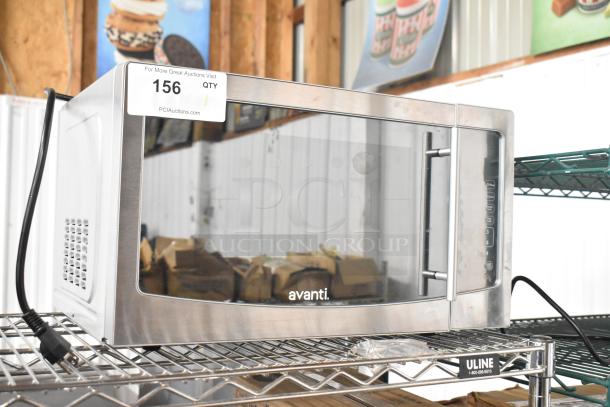 Avanti MT116V4M countertop microwave oven, stainless steel, 120V, 1 phase, model MT116V4M, excellent condition, visible auction label.
