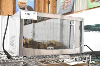 Avanti MT116V4M countertop microwave oven, stainless steel, 120V, 1 phase, model MT116V4M, excellent condition, visible auction label.