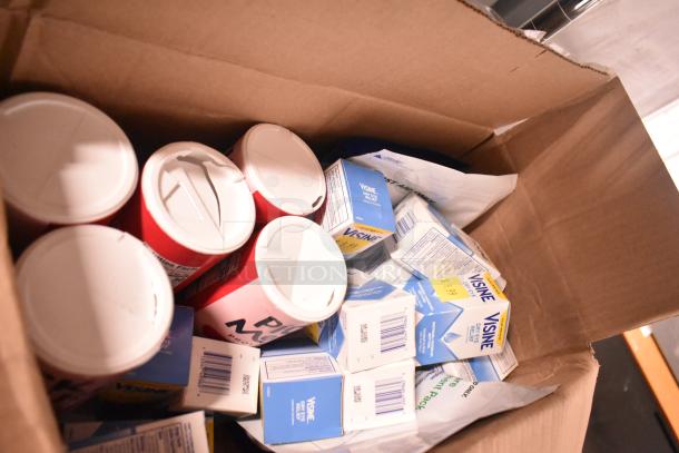 Box containing Visine Dry Eye Relief, Pick Me Up Pure Sugar, and First Aid Eye Care Treatment Pack, new.