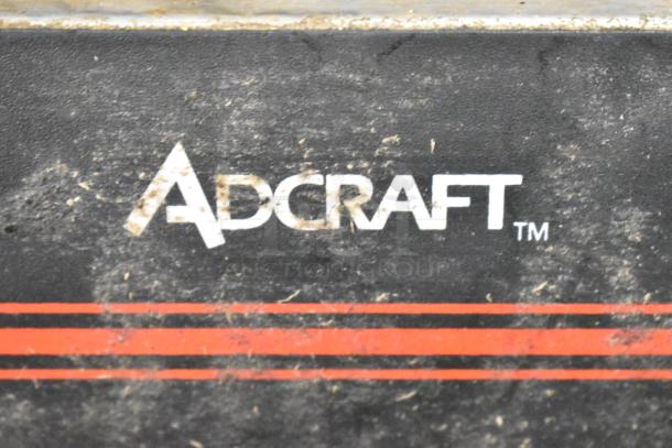 Adcraft SG-813 Countertop Double Panini Press, 120V, 1 Phase. Visible wear on surface, "Adcraft" logo present.