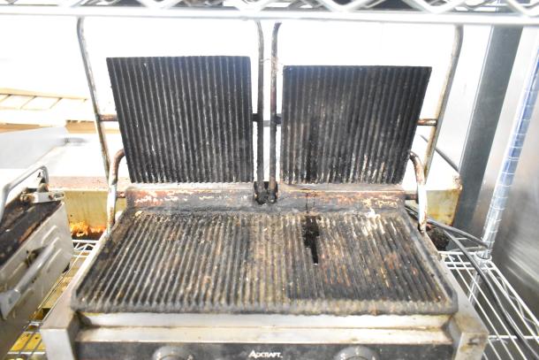 Adcraft SG-813 Double Panini Press, countertop model, 120 volts, used condition with visible wear and grill marks.