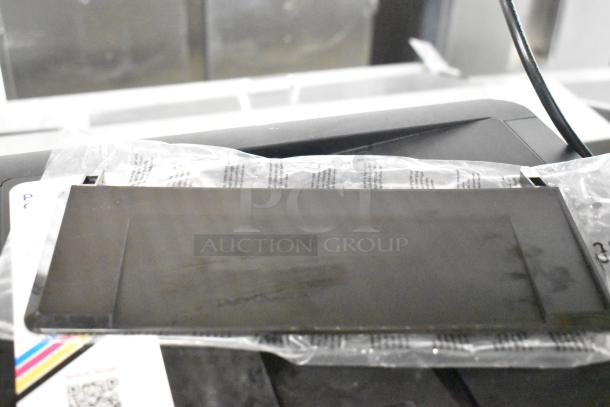 Swingline 535 silver-platinum electric 3-hole punch, 28-sheet capacity, 9/32" holes, excellent condition, includes power cord.