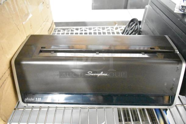 Swingline 535 electric 3-hole punch, silver-platinum, 28 sheet capacity, 9/32" holes, commercial model, good condition.