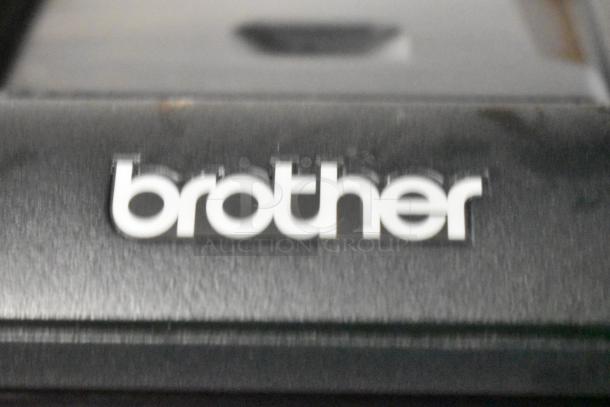Brother MFC-J1170DW printer close-up, featuring brand logo. Model details not visible. Condition appears used.