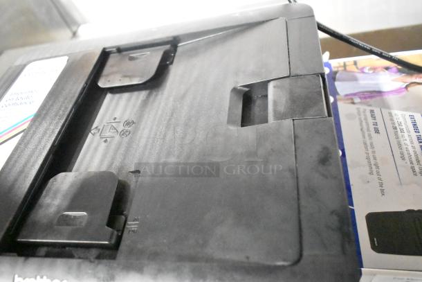 Brother MFC-J1170DW countertop copier scanner printer, black finish, visible control panel, in good condition.