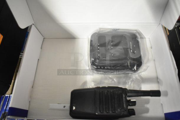 Biztalk BR200 Business Band Two Way Radio in box, includes radio unit and charging base, appears new in packaging.