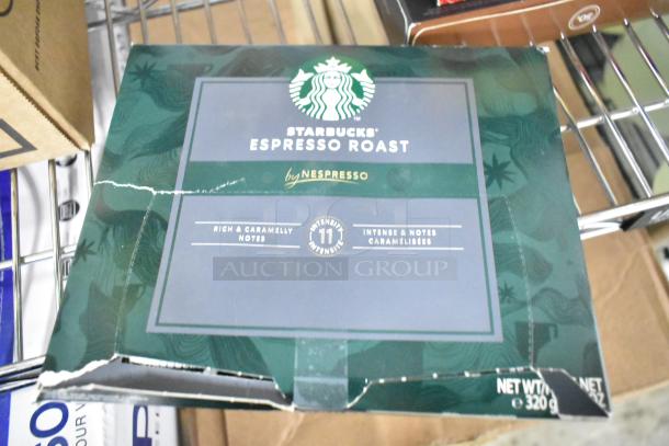 Starbucks Espresso Roast by Nespresso box, rich caramel notes, 320g, slightly worn packaging.