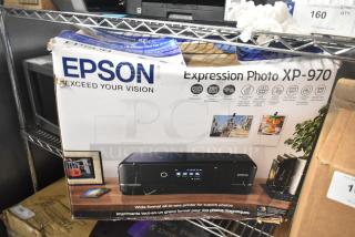 Epson Expression Photo XP-970 Wide Format Printer in original packaging; features Wi-Fi, touchscreen, and photo printing.