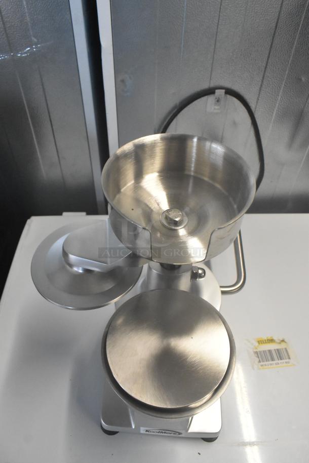 Brand new KoolMore CHM-5 hamburger patty molding press. Stainless steel with handle, minor scratches, barcode visible.
