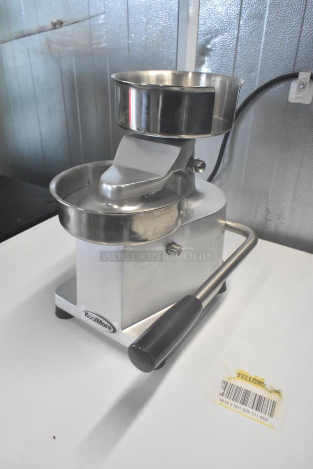 Brand new KoolMore CHM-5 hamburger patty molding press, heavy-duty, stainless steel with handle, minor scratches, model label visible.