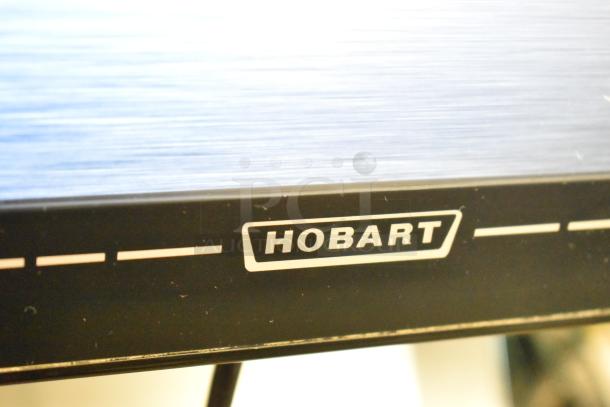 2017 Hobart HTi-7LH26 metal commercial scale, tested, no power cord, 120/208-240V, 1 phase, brand logo visible.