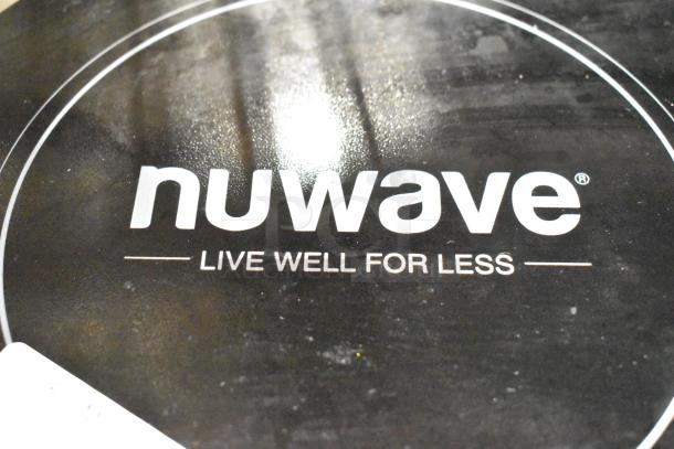 Nuwave 30501 countertop induction burner with "Live Well For Less" slogan. Used condition. 115V, 1 phase.