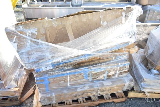 Pallet with 8 brand new scratch and dent items wrapped in plastic, includes equipment stand and pot rack. Tags marked "338".